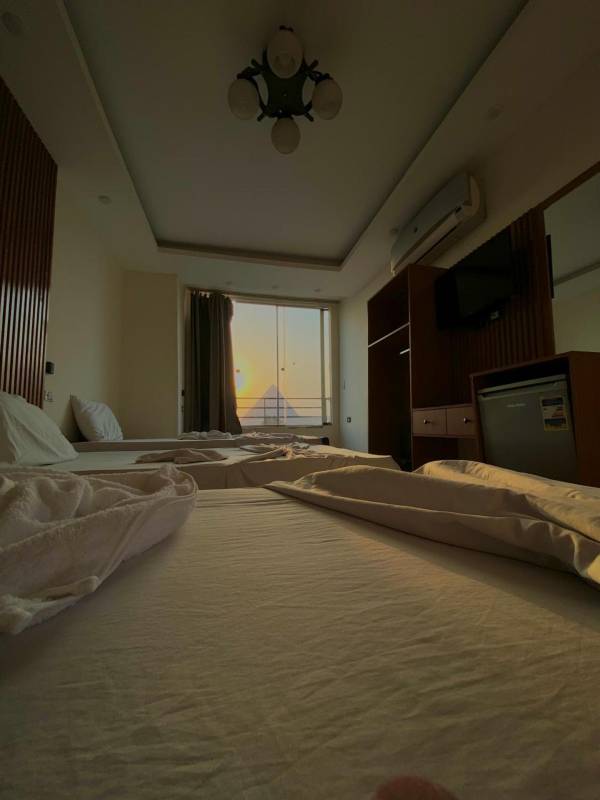 Dreibettzimmer mit Bergblick
